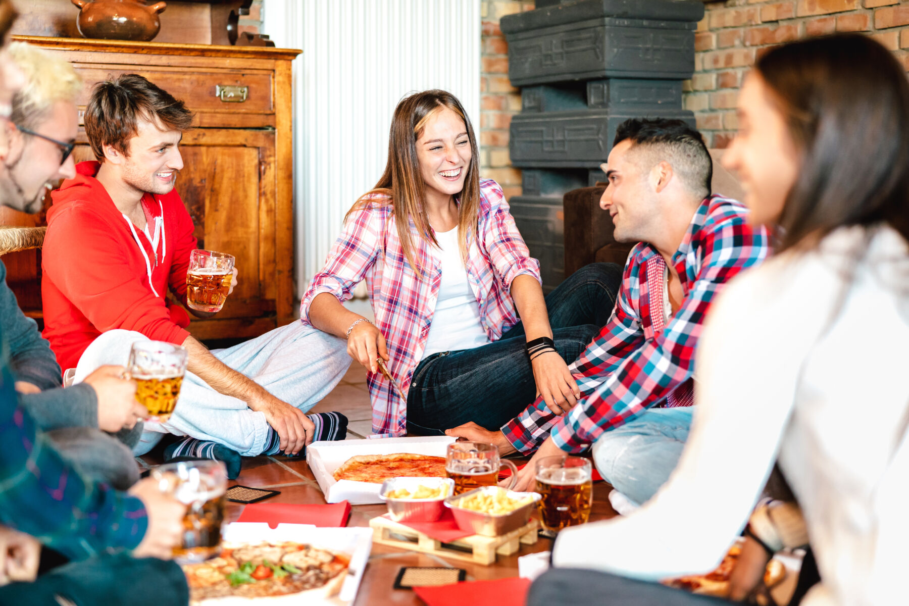 PadMates enjoying pizza in their coliving space