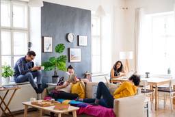 Photo shows group of adults living together in a coliving home at PadSplit.