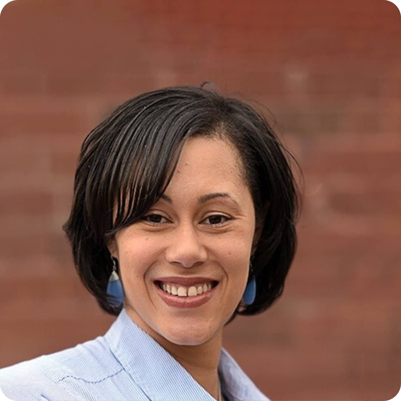 A photo of an African-American woman smiling