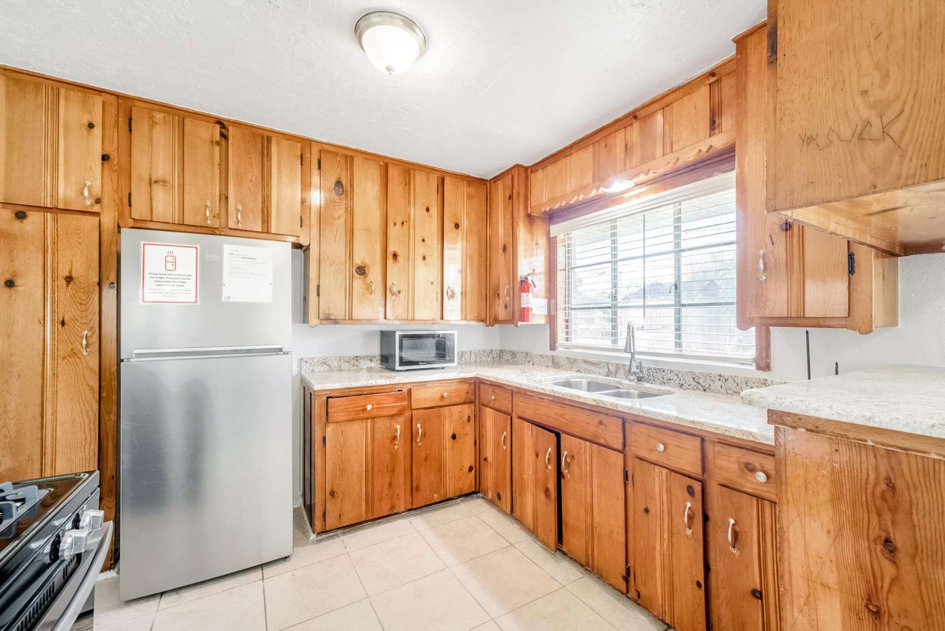 kitchen, detected: refrigerator, oven, microwave