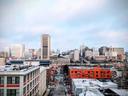 View of the Richmond, Virginia city skyline with tall and short office and residential buildings.