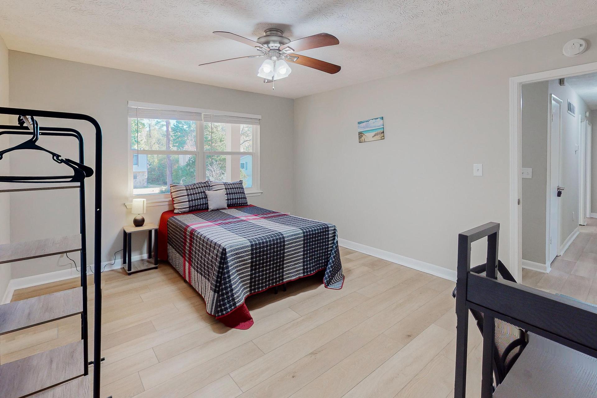 Large (175 sq feet), bright bedroom. Upper floor facing street.