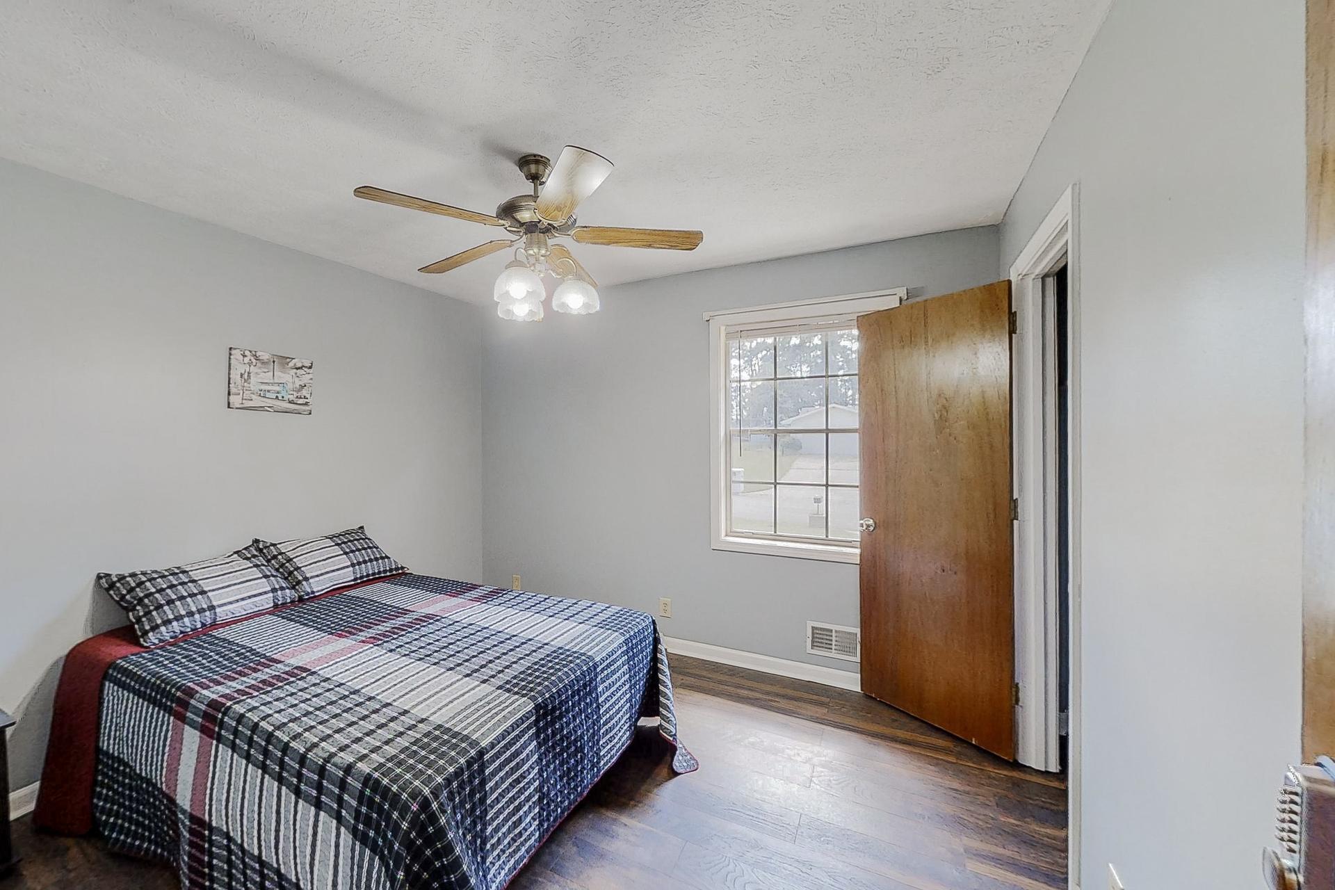 bedroom, detected: ceiling fan, window blind, bed