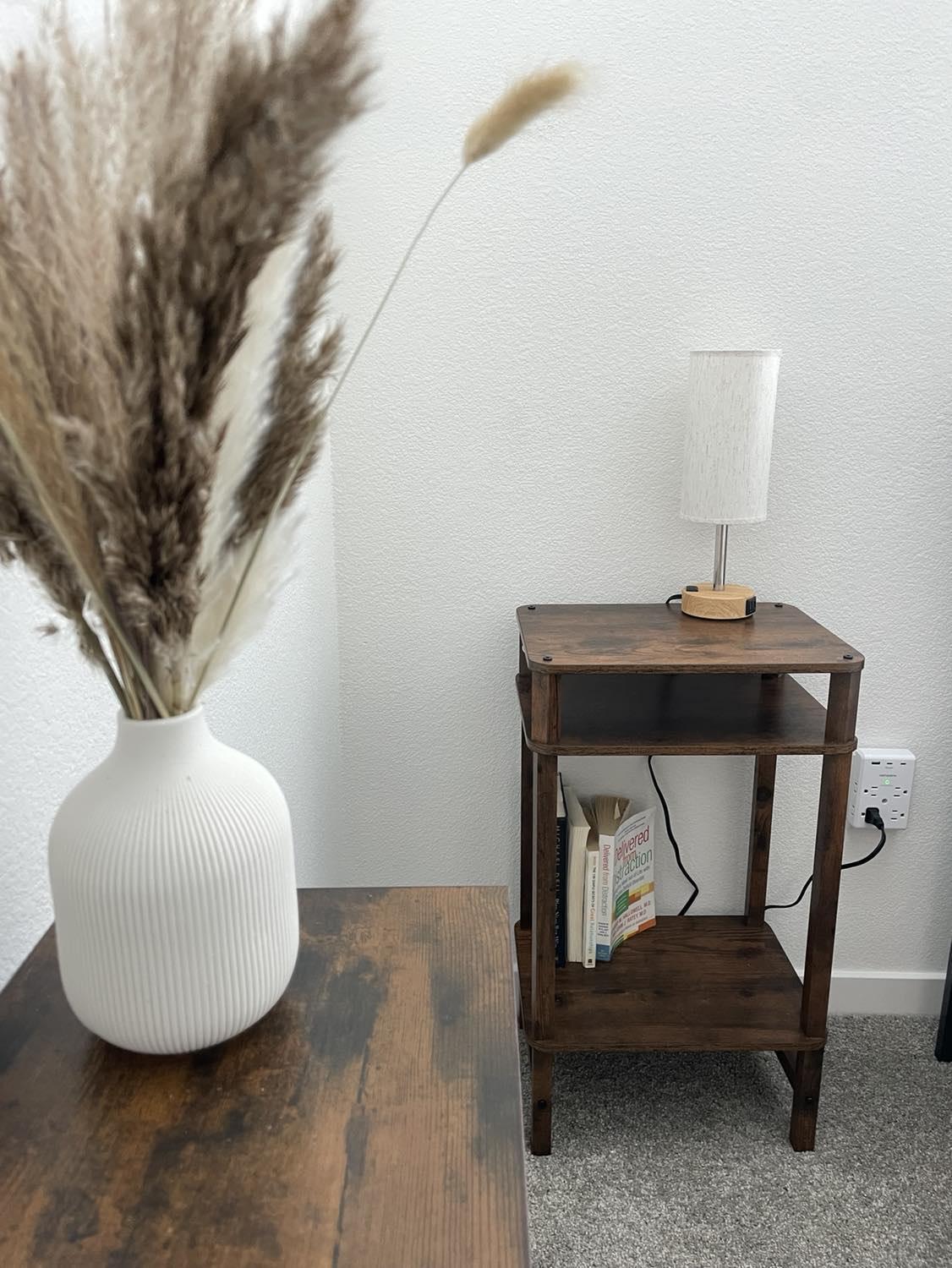 Sleep well with our 3 way dimmable touch lamp with a USB charging port. Books are included for your stay.