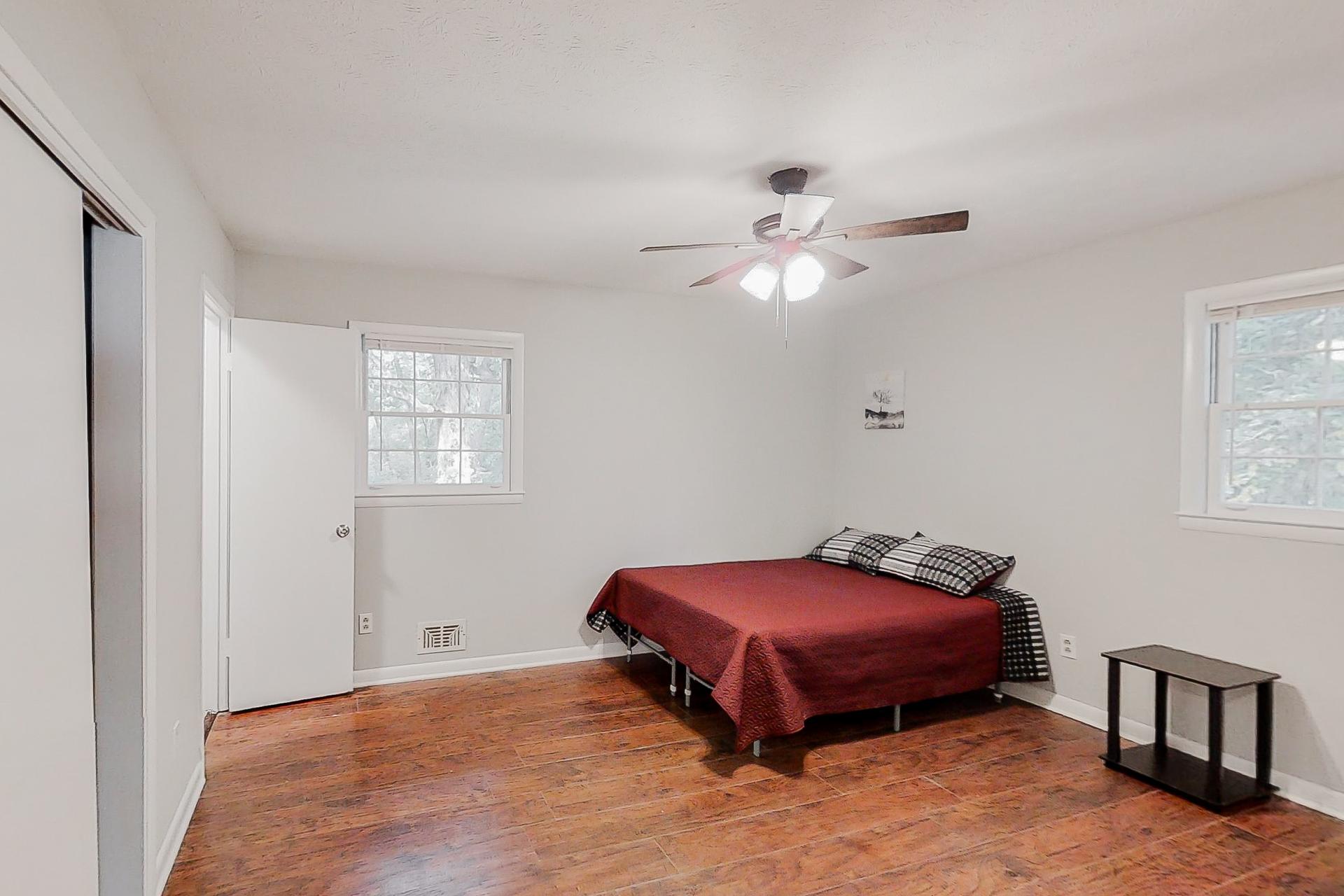 bedroom, detected: ceiling fan, bed, window blind