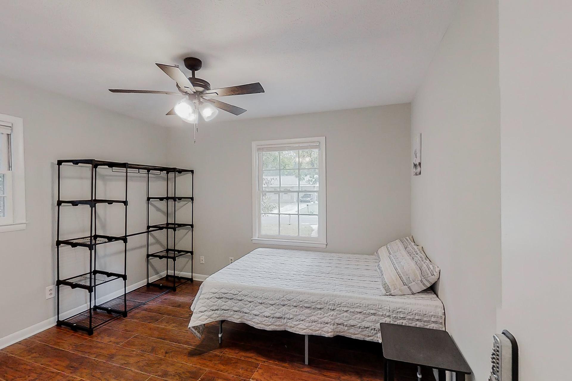 bedroom, detected: ceiling fan, window blind, bed