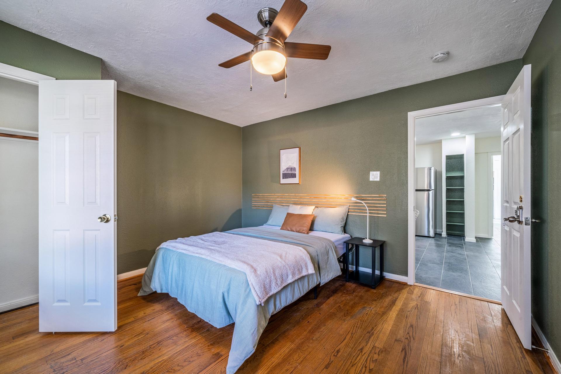 bedroom, detected: ceiling fan, bed, window blind