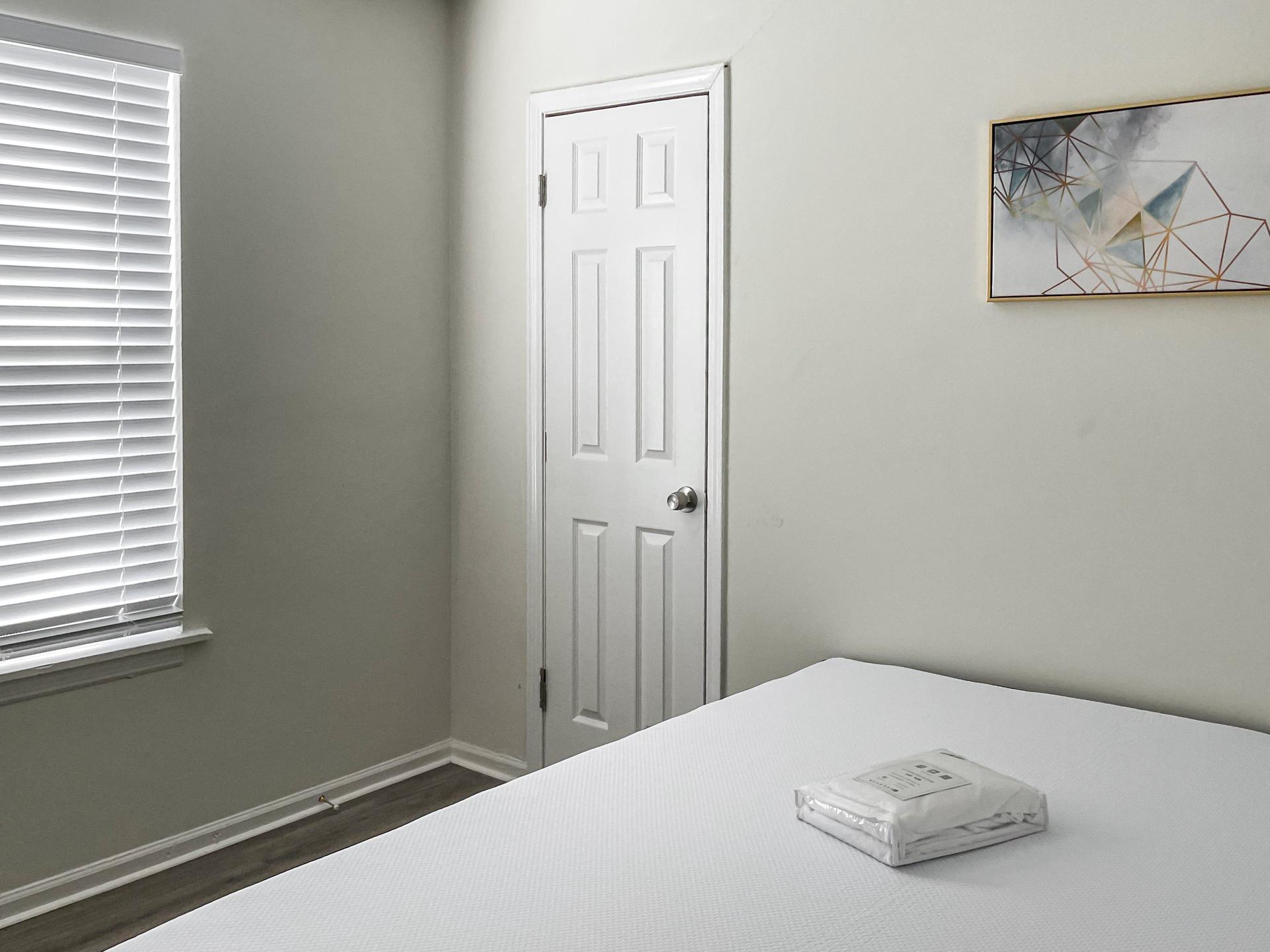bedroom, detected: window blind, bed