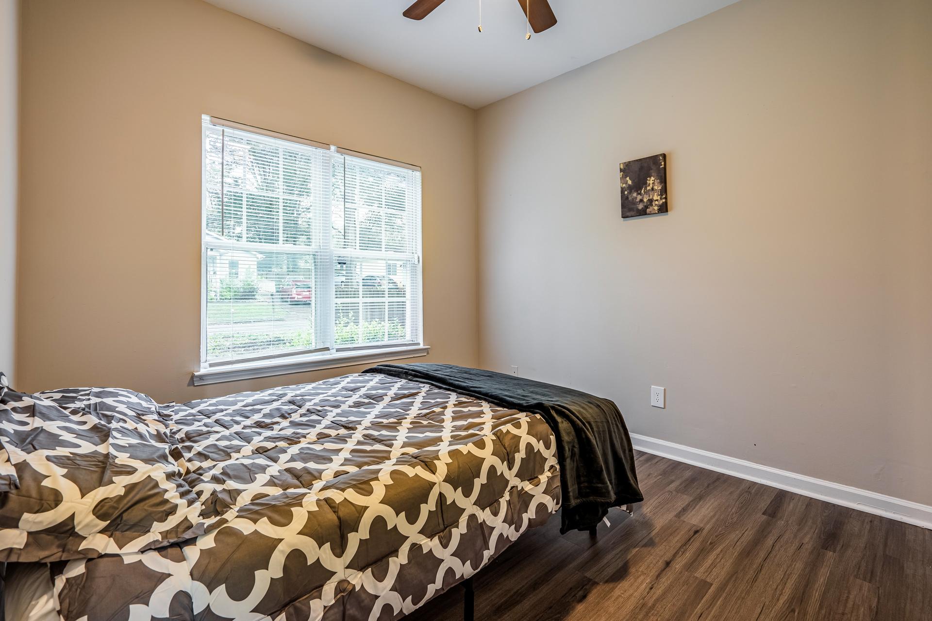 bedroom, detected: ceiling fan, window blind, bed
