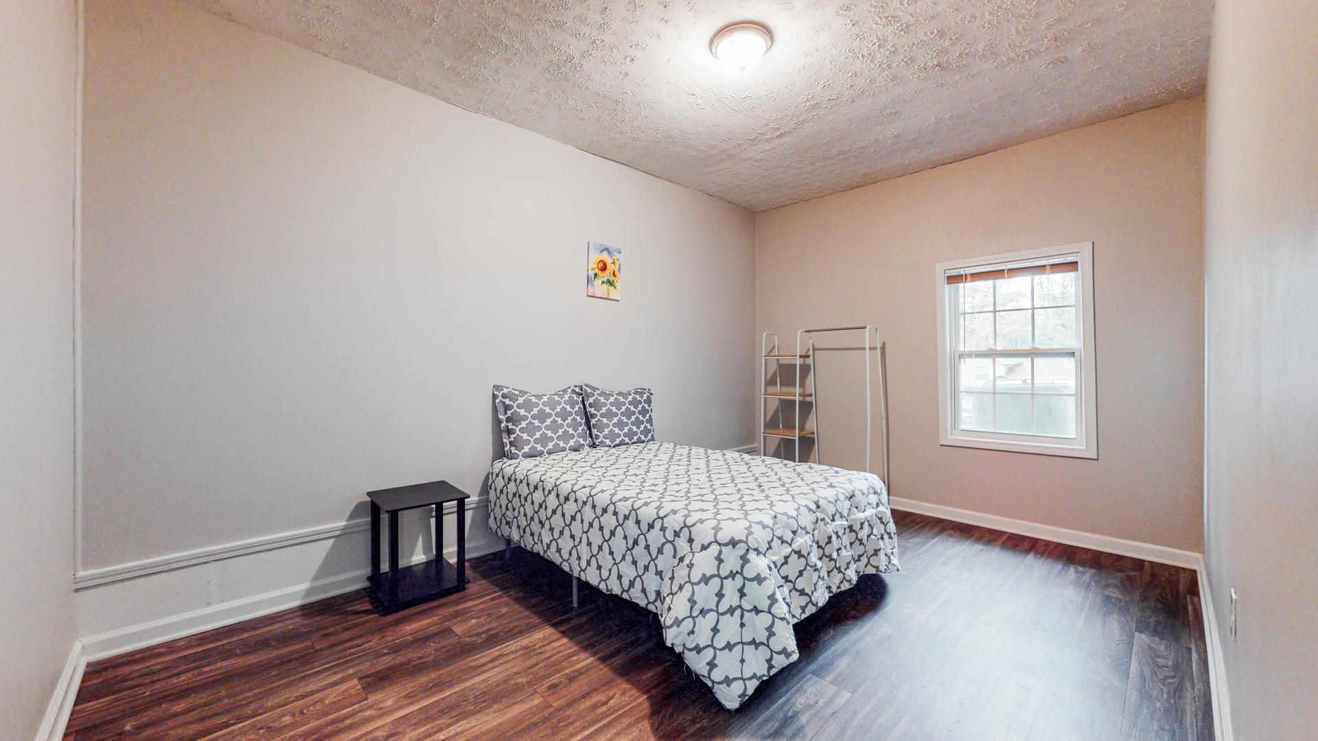 bedroom, detected: window blind, bed