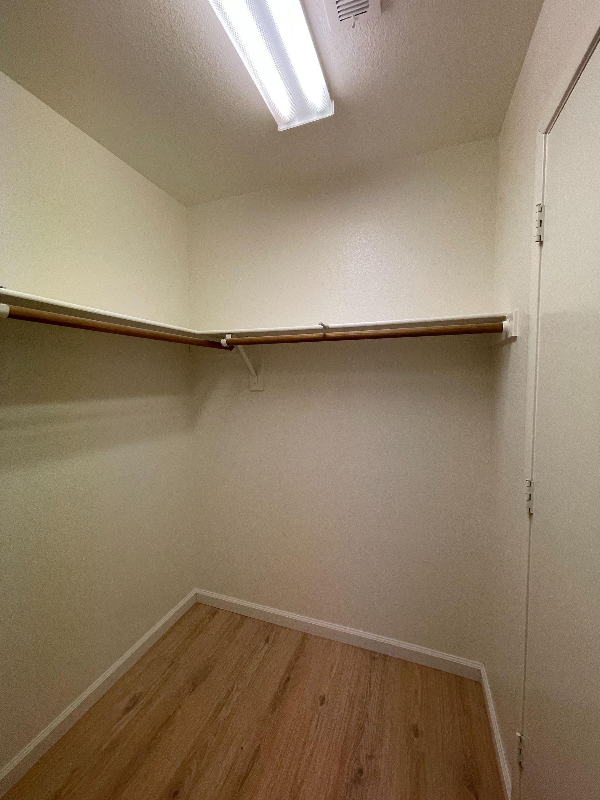 Right side of large walk-in closet