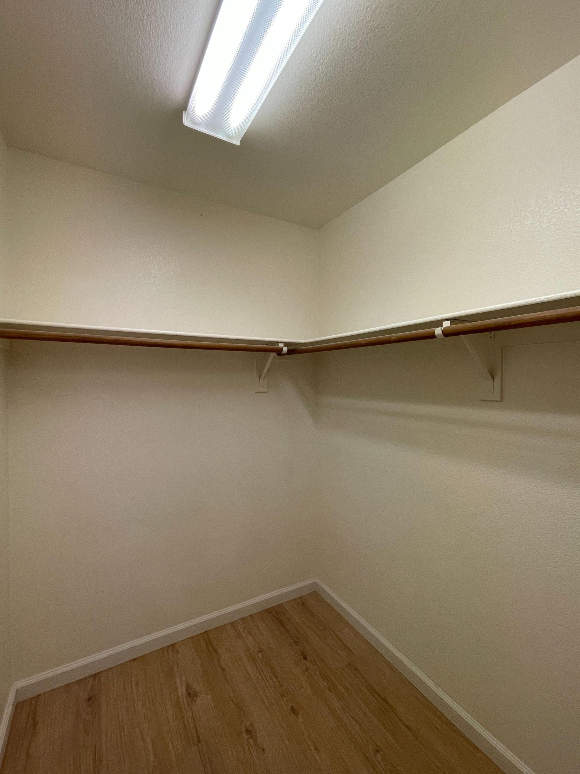 Left side of large walk-in closet