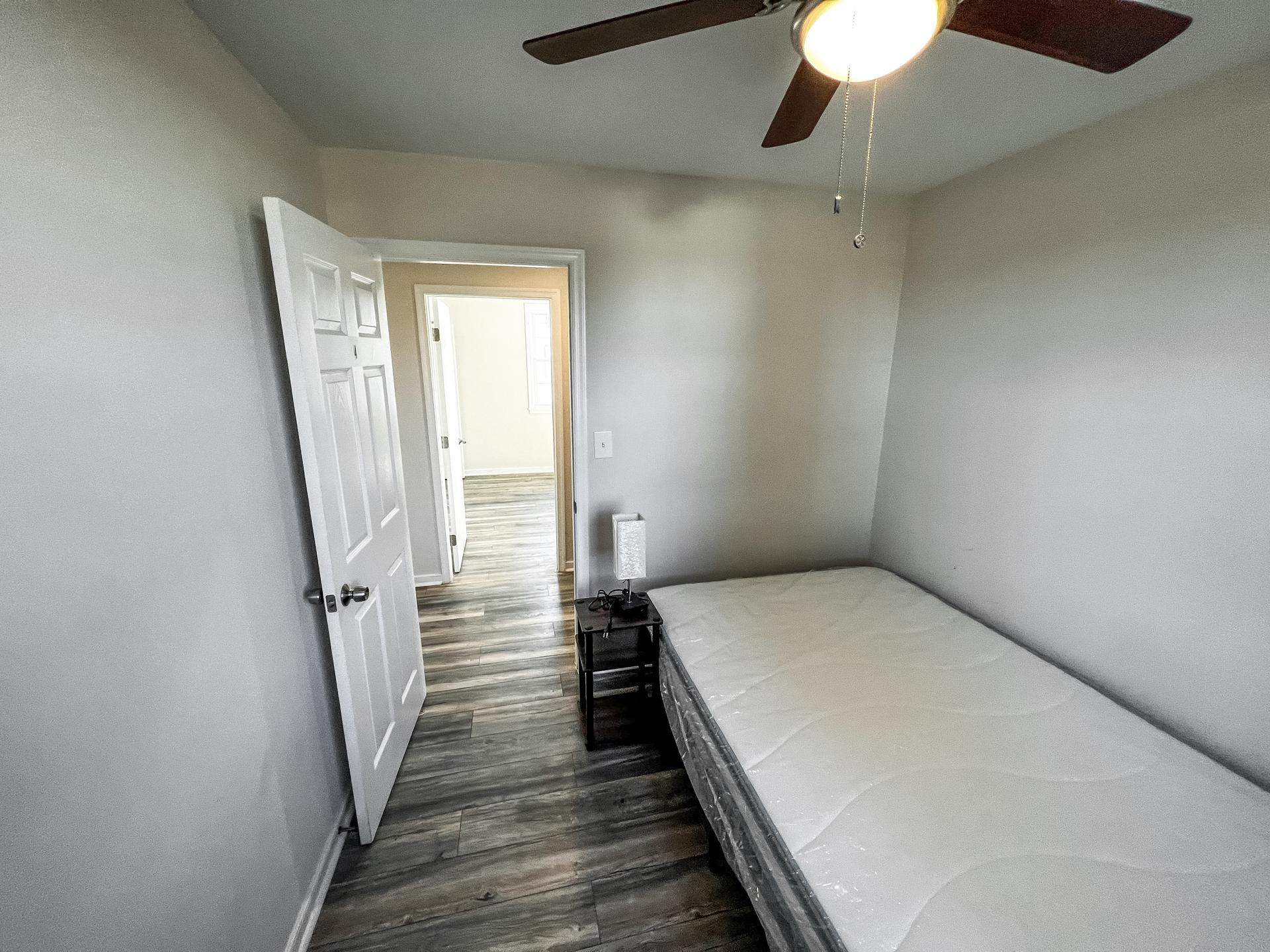 bedroom, detected: ceiling fan, bed, window blind