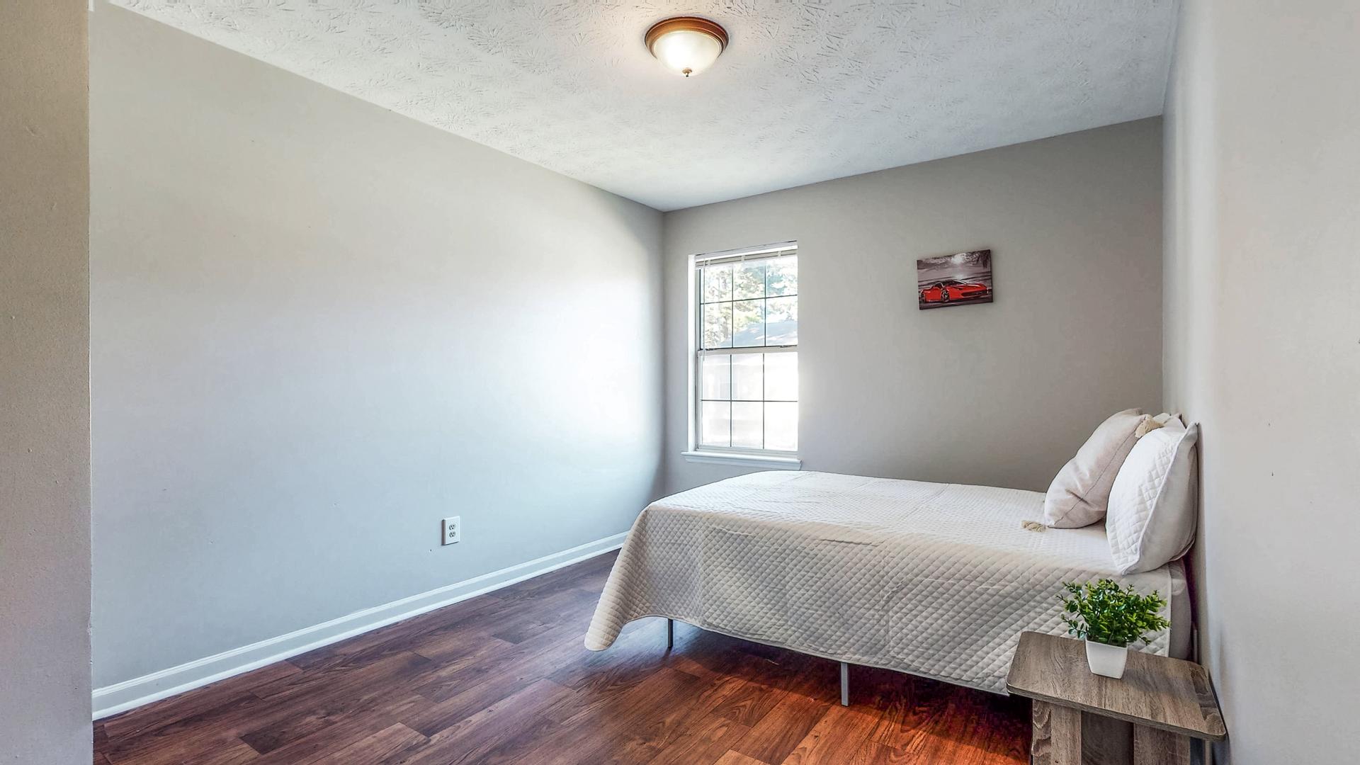 bedroom, detected: window blind, bed