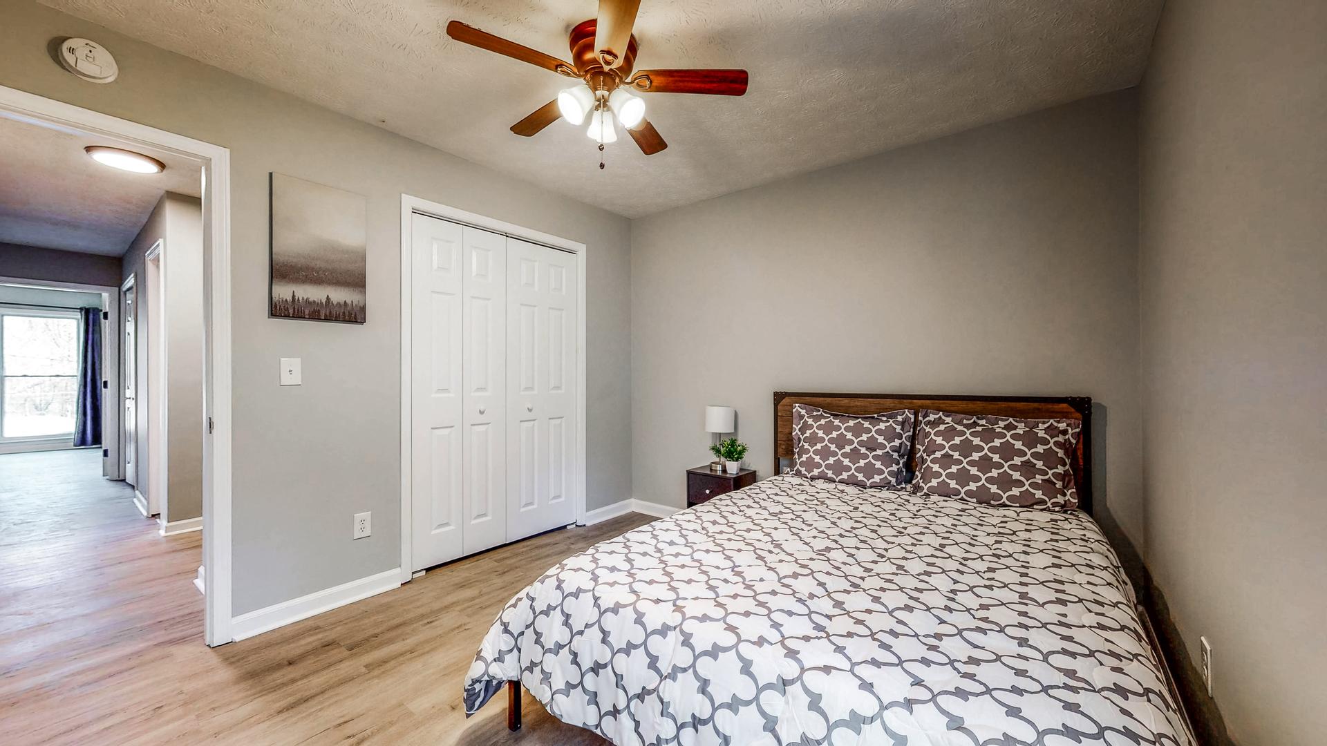 bedroom, detected: ceiling fan, bed, window blind