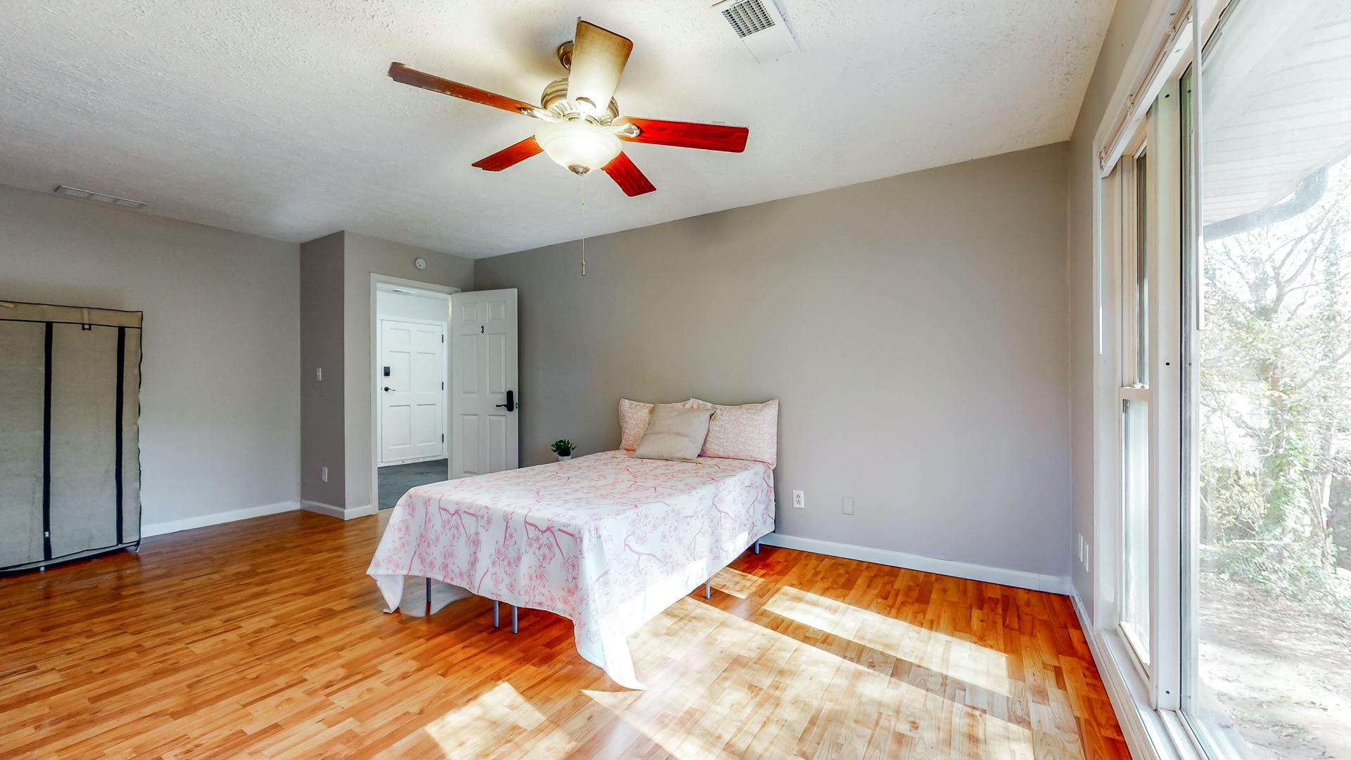 bedroom, detected: ceiling fan, bed, window blind