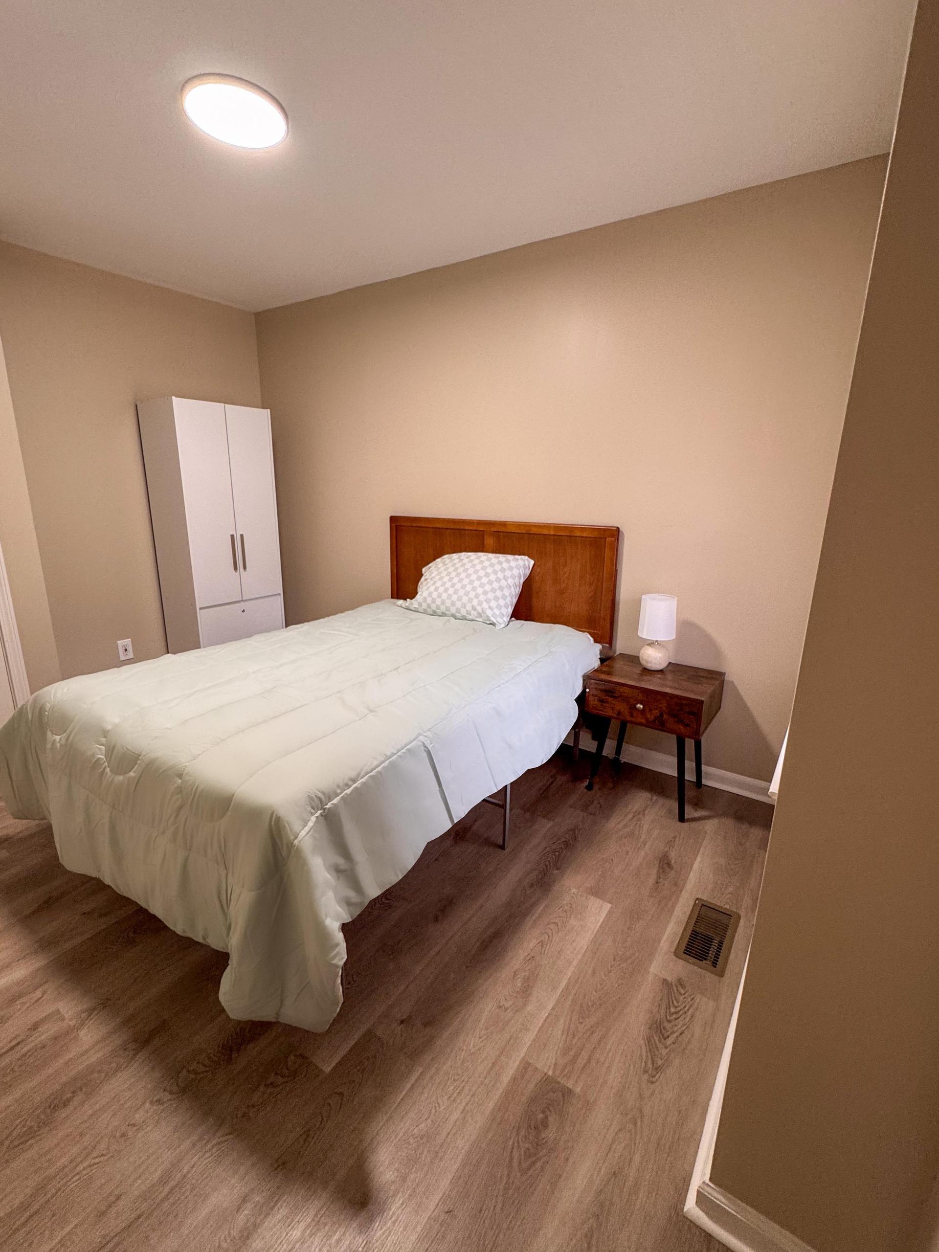 Room 1 includes a private bath