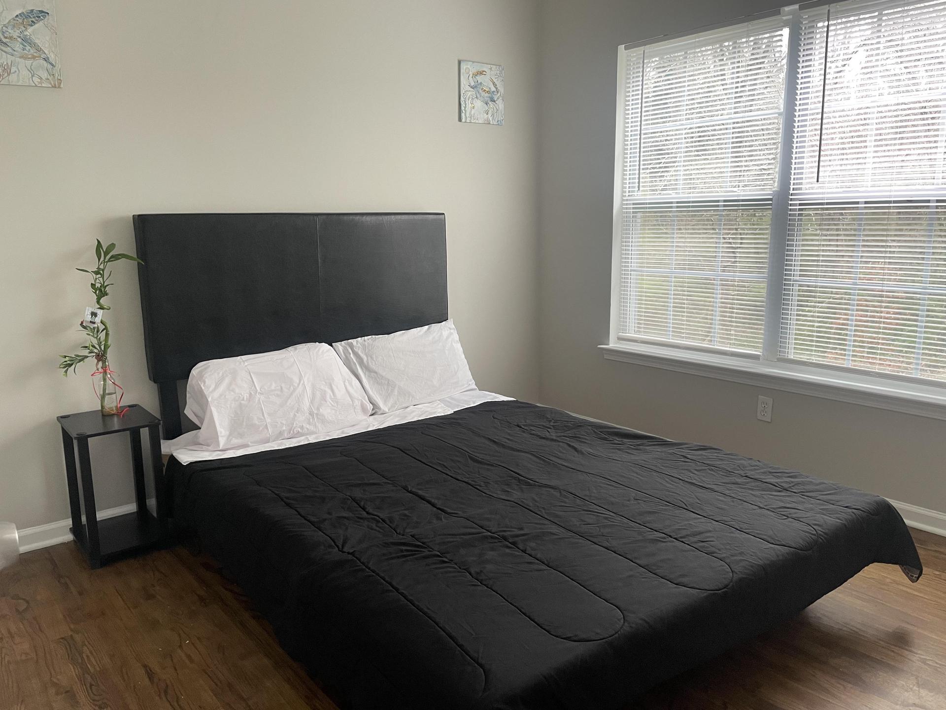 Private bedroom with 2 reach-in closets and beautiful hardwood floors.  Full, private bathroom