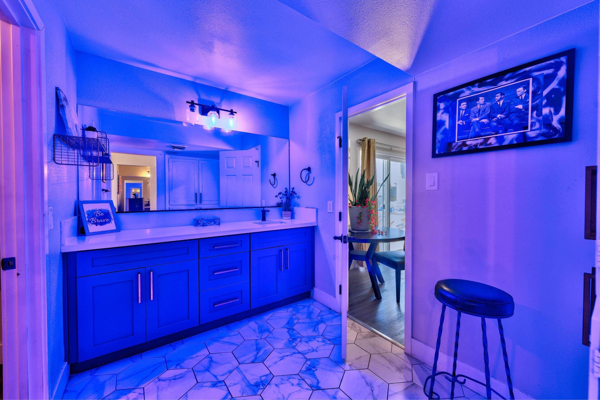 2nd sink area with blue lighting.. changable lighting if
