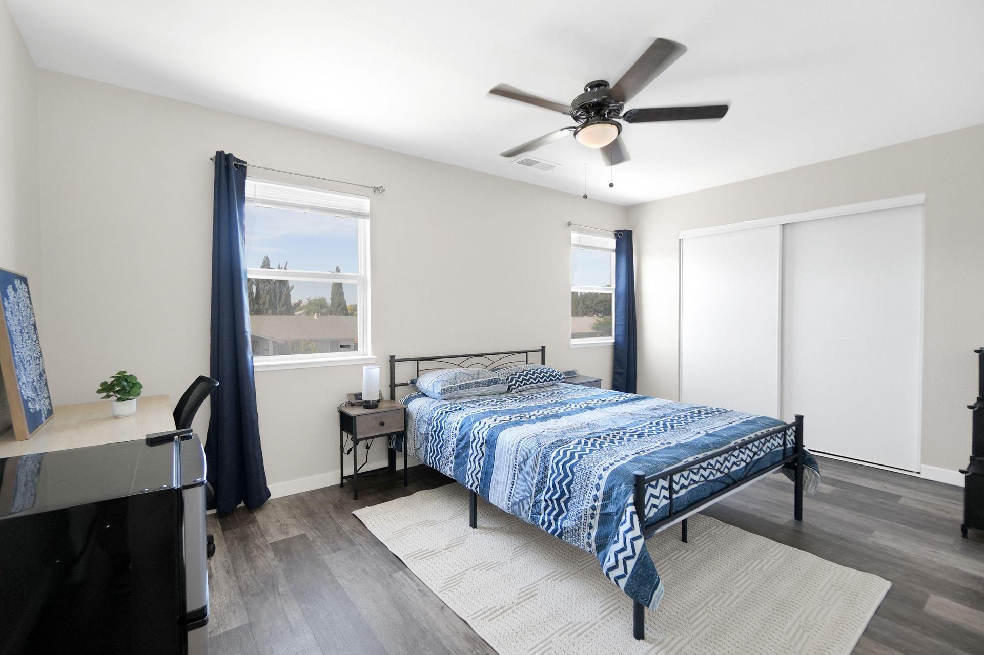 Large 2nd floor bedroom at the front of the house with 2 windows for plenty of natural light and a large closet