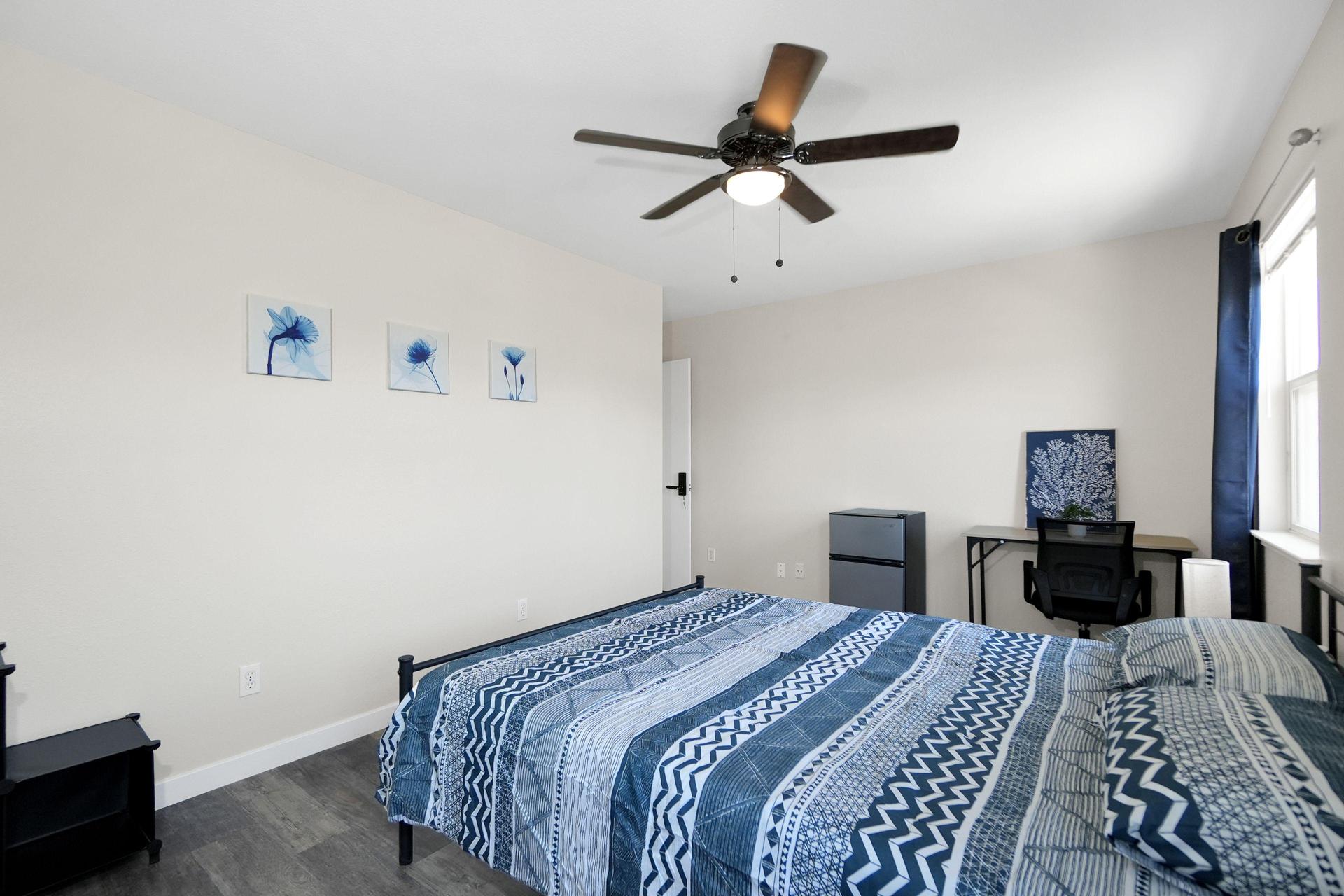 Personal minifridge, workspace, and ceiling fan for comfort within your space