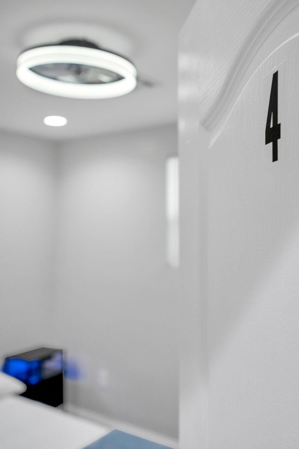 Cozy and newly renovated room with a comfortable bed, modern lighting, and a smart TV for your entertainment.