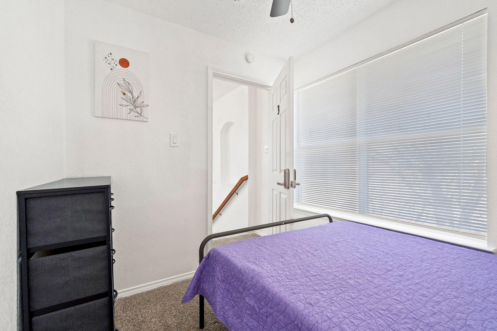 bedroom, detected:bed, window blind, ceiling fan