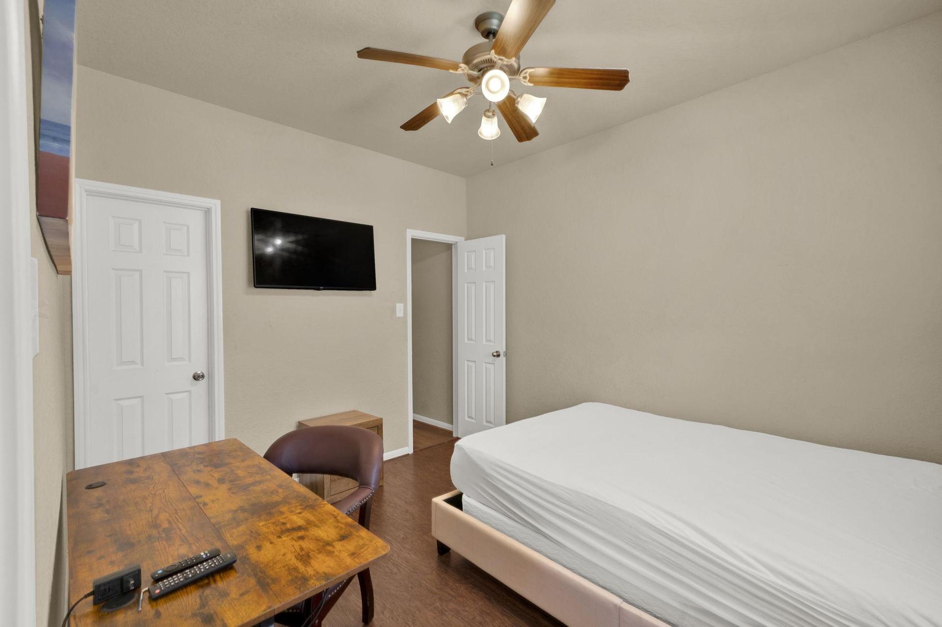 Ceiling Fan and Mounted TV