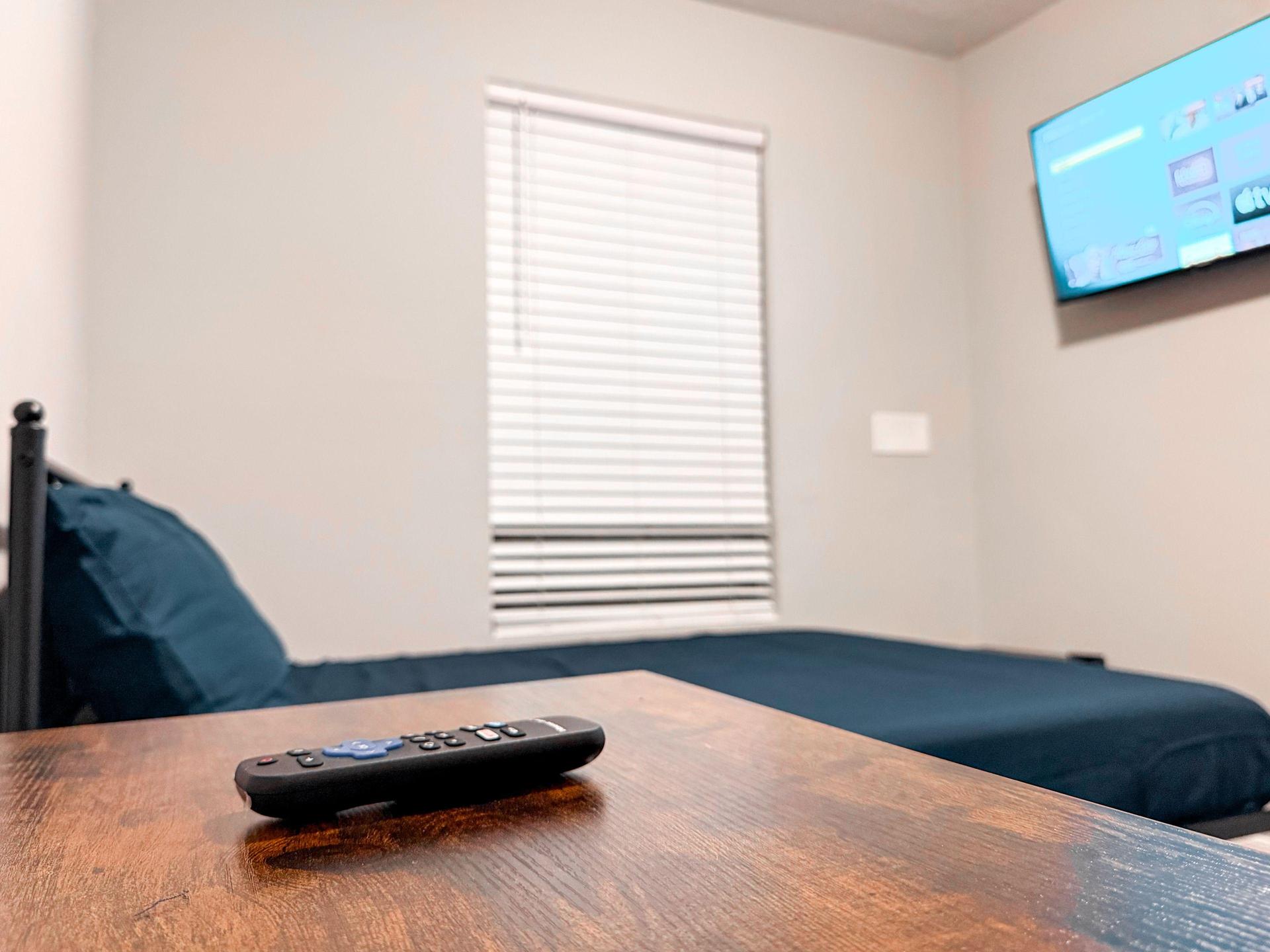 4K Smart TV and mini fridge