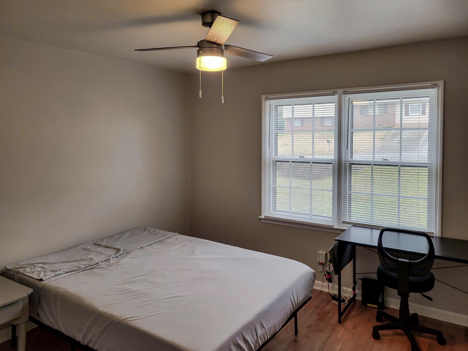 bedroom, detected: bed, window blind, ceiling fan