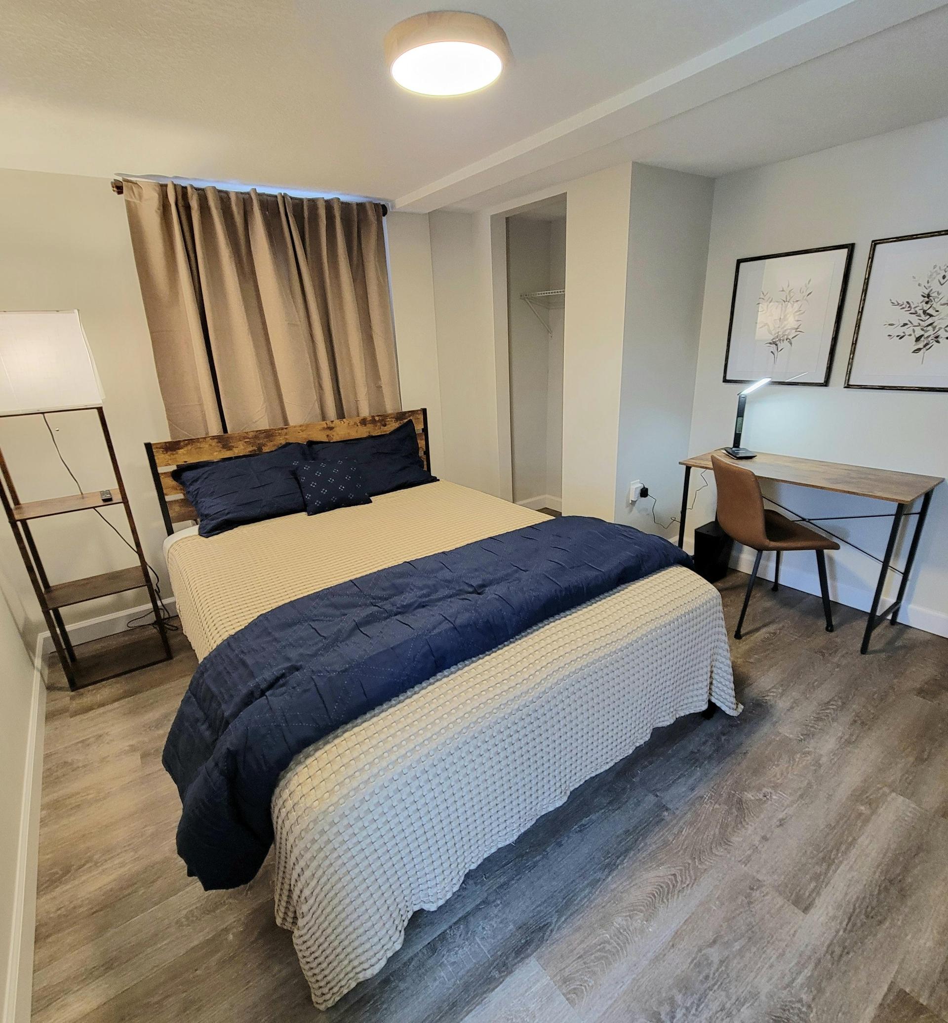 Lower level room with private half bath on main floor and shared shower on 2nd floor.