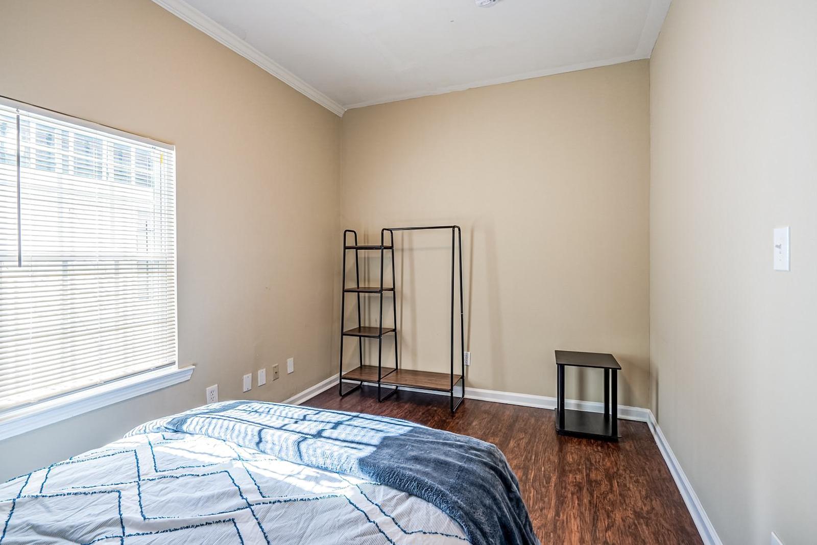 bedroom, detected: window blind, bed
