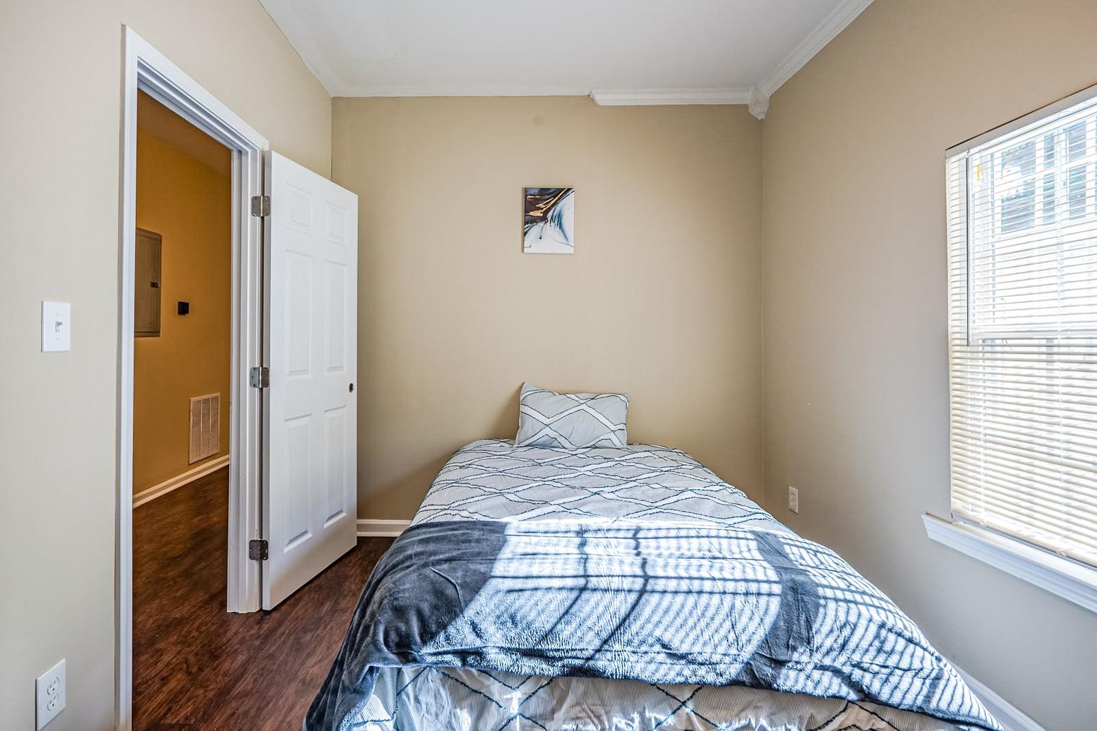 bedroom, detected: window blind, bed