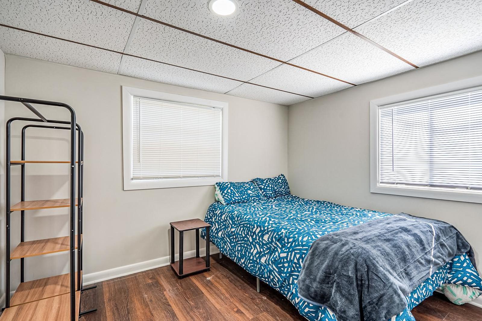 bedroom, detected: window blind, bed
