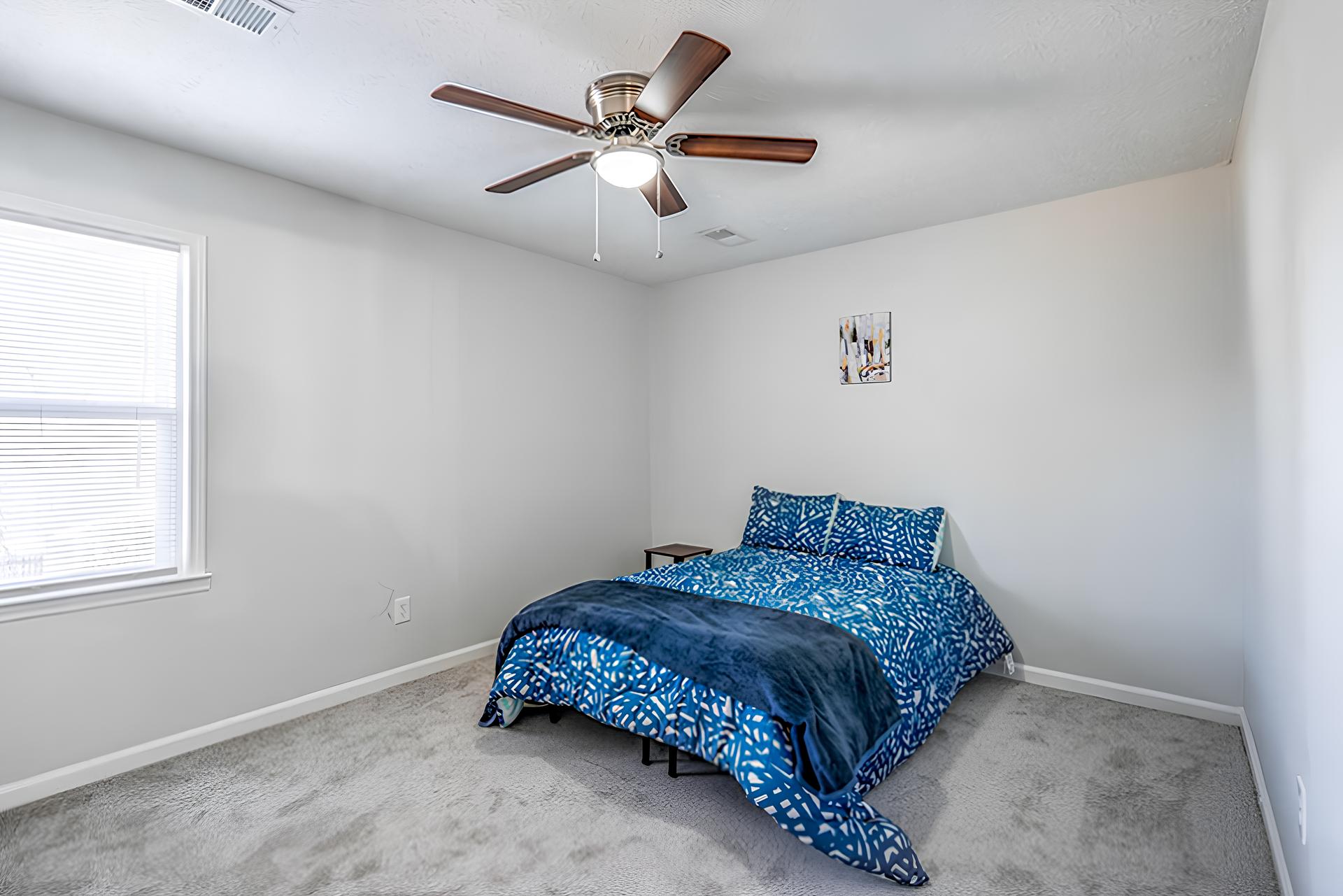 bedroom, detected: ceiling fan, window blind, bed