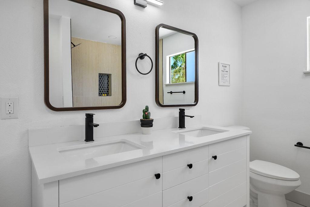 Double vanity, elongated toilets. Own personal bathroom