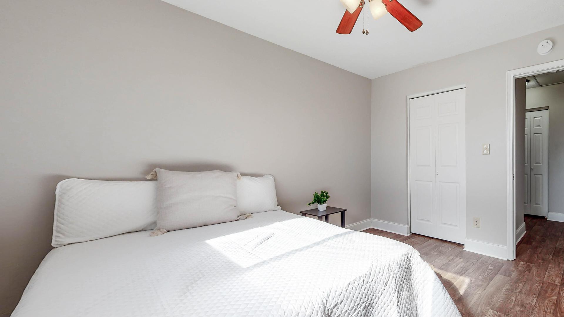 bedroom, detected: ceiling fan, bed, window blind