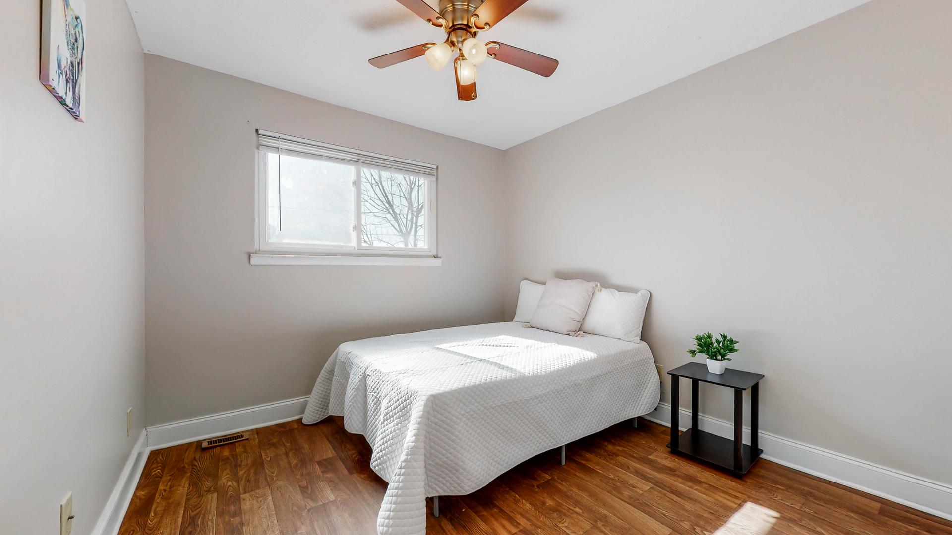 bedroom, detected: ceiling fan, window blind, bed