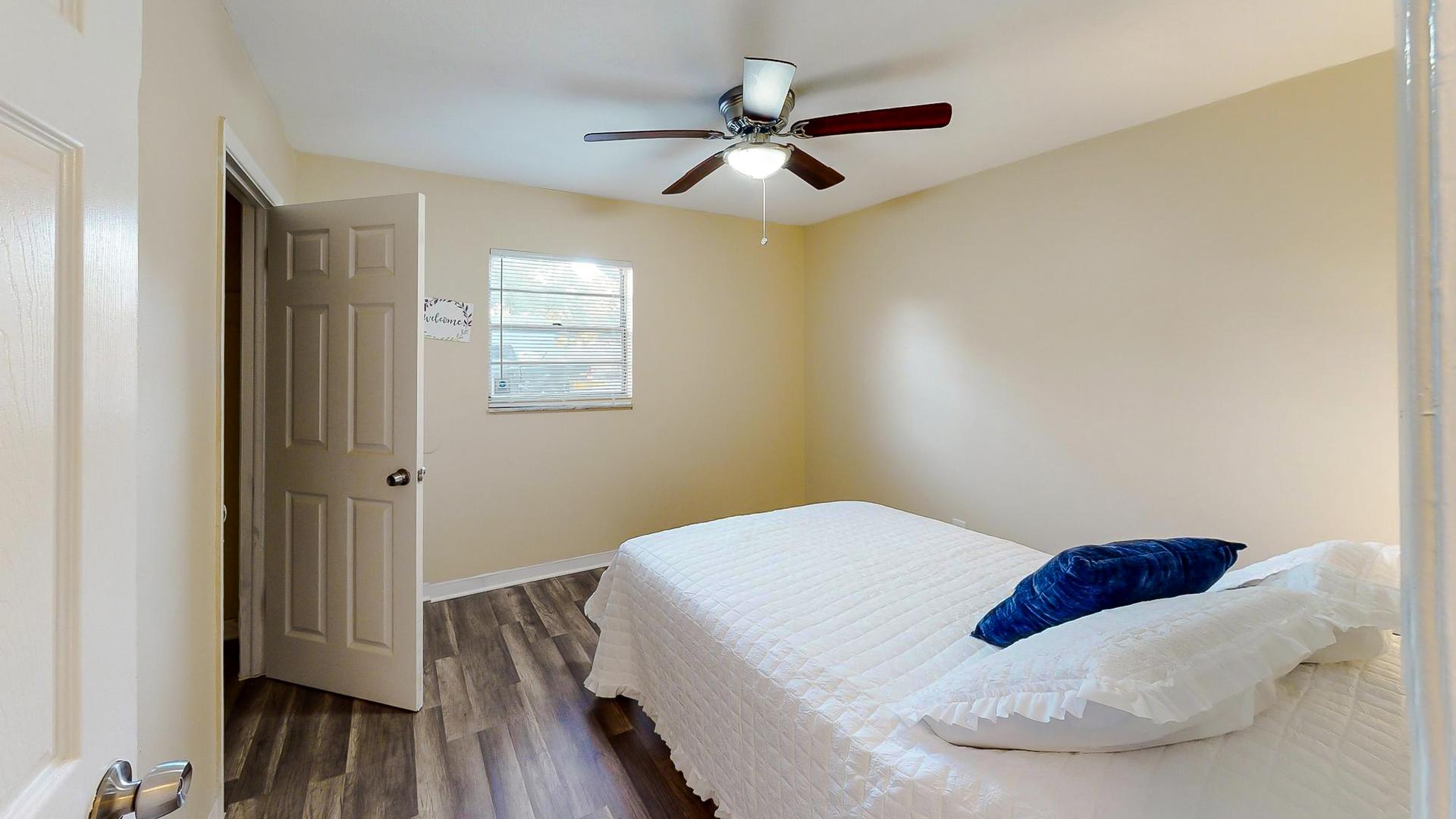 bedroom, detected: ceiling fan, bed, window blind