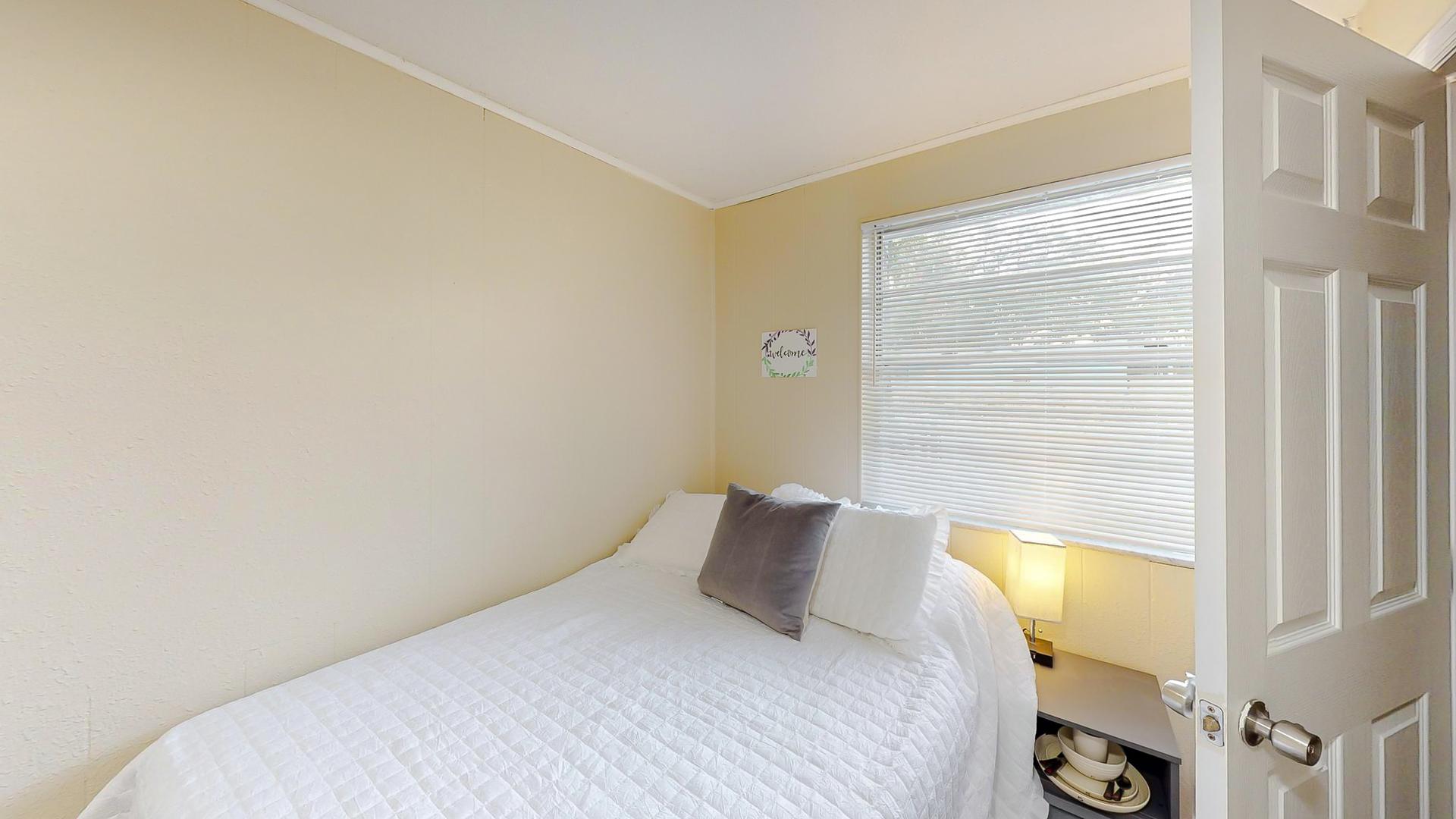 bedroom, detected: window blind, bed