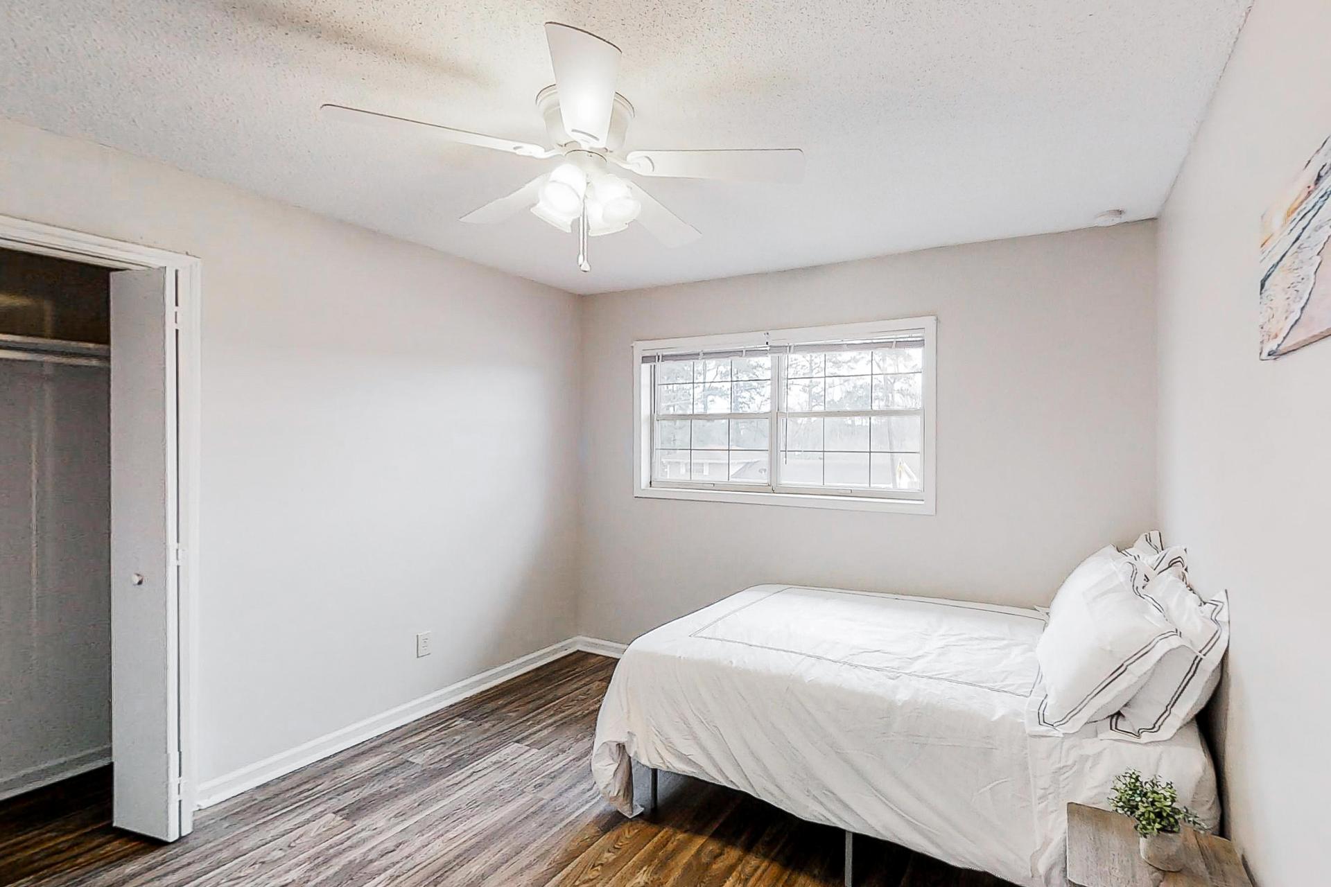 bedroom, detected: ceiling fan, window blind, bed