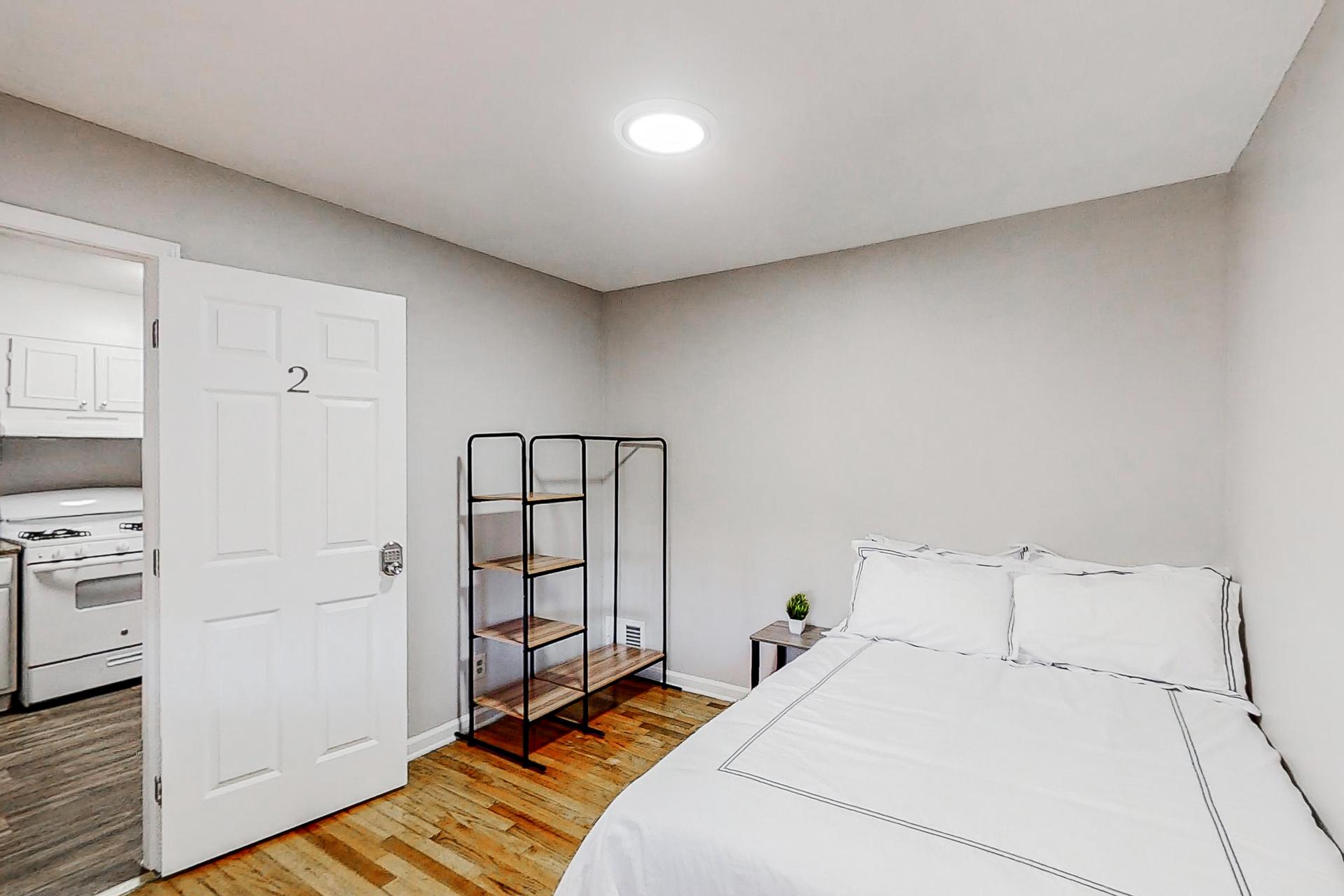 bedroom, detected: bed, refrigerator