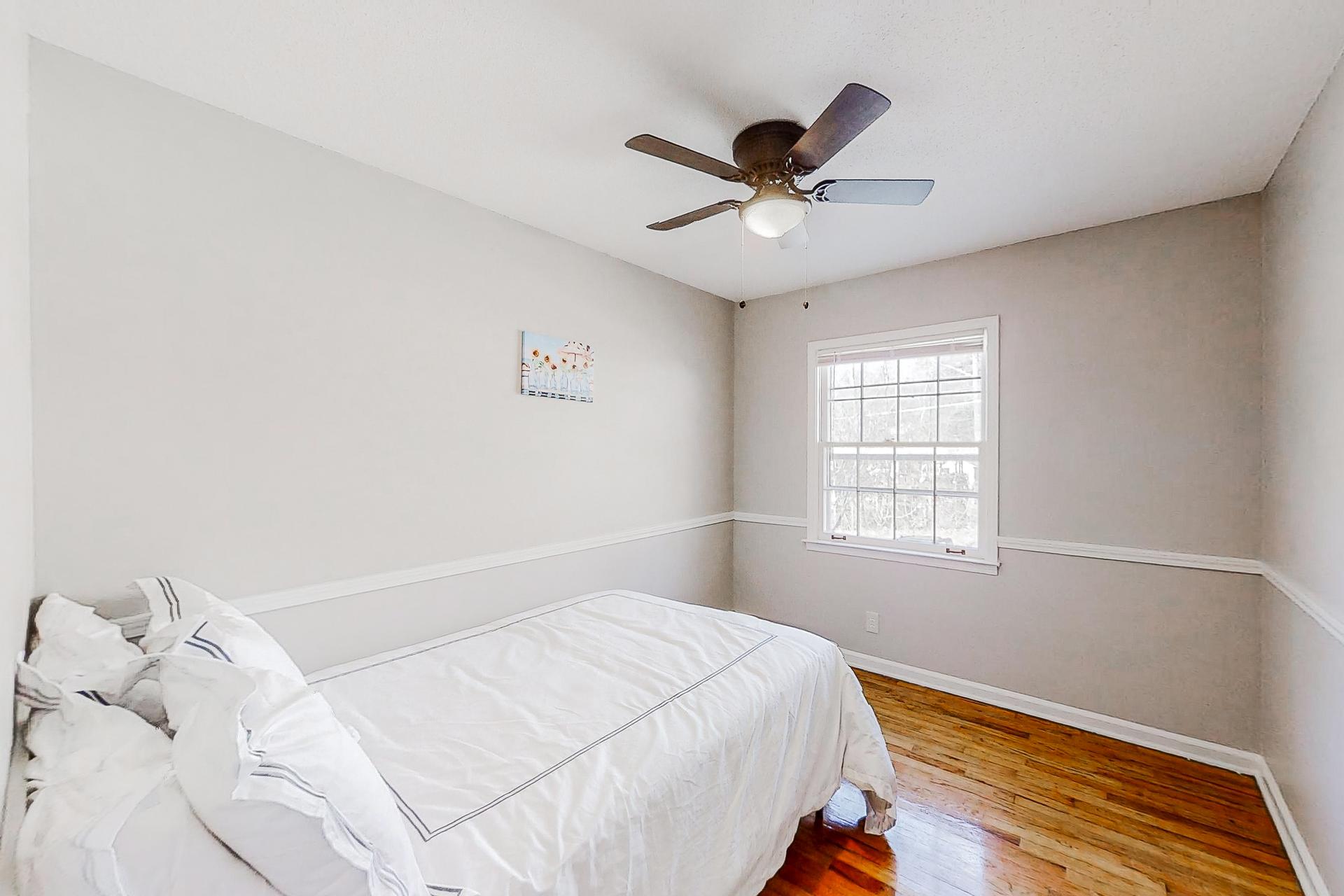 bedroom, detected: ceiling fan, window blind, bed