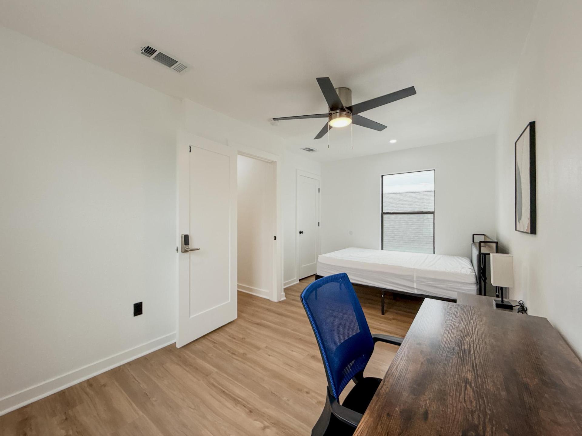 Bedroom 3 - Large room with workspace and closet