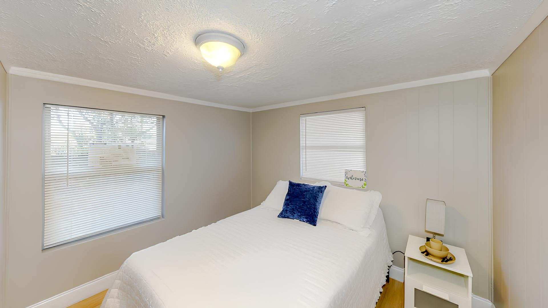 bedroom, detected: window blind, bed