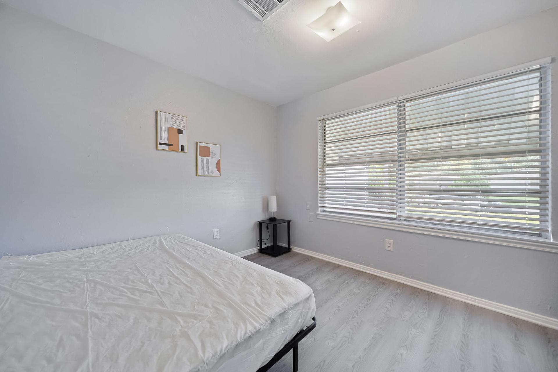 bedroom, detected: window blind, bed