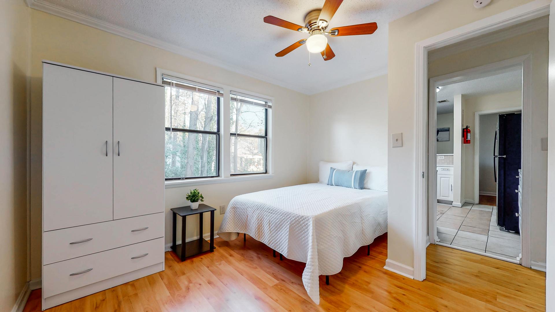 bedroom, detected: ceiling fan, window blind, bed
