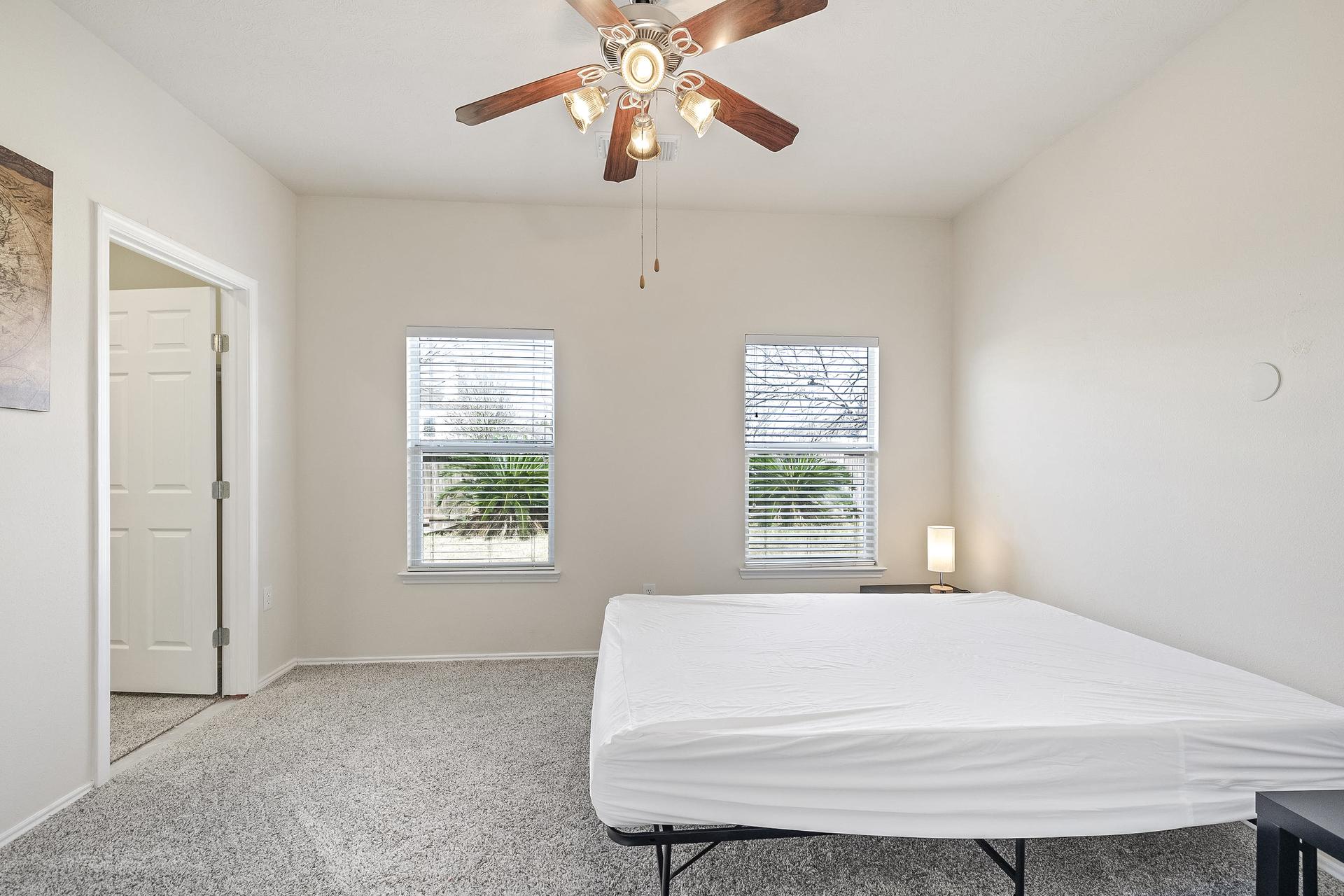 bedroom, detected: ceiling fan, window blind, bed