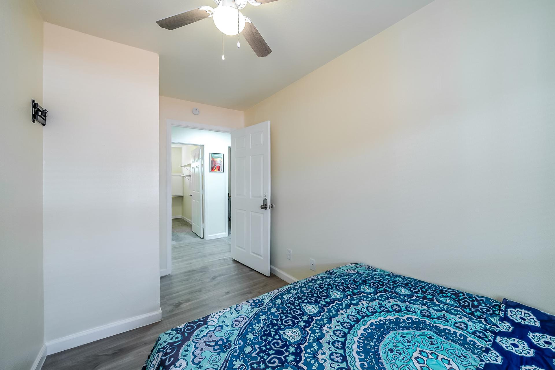 bedroom, detected: ceiling fan, bed, window blind