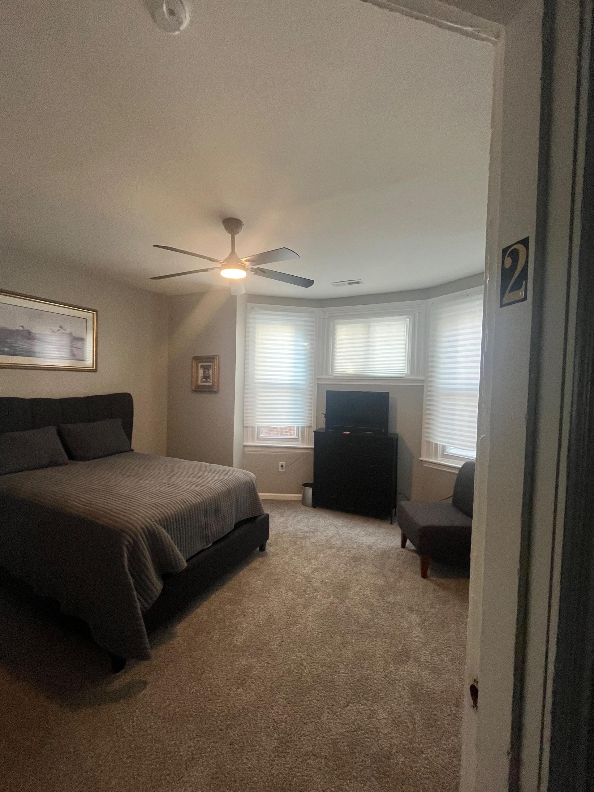 Bedroom 2 TV chair and closet